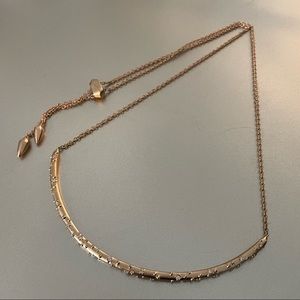 Kate Spade adjustable rose gold curved necklace
